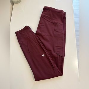 Lululemon Fast and Free leggings, dark red, size 6, with side pockets!